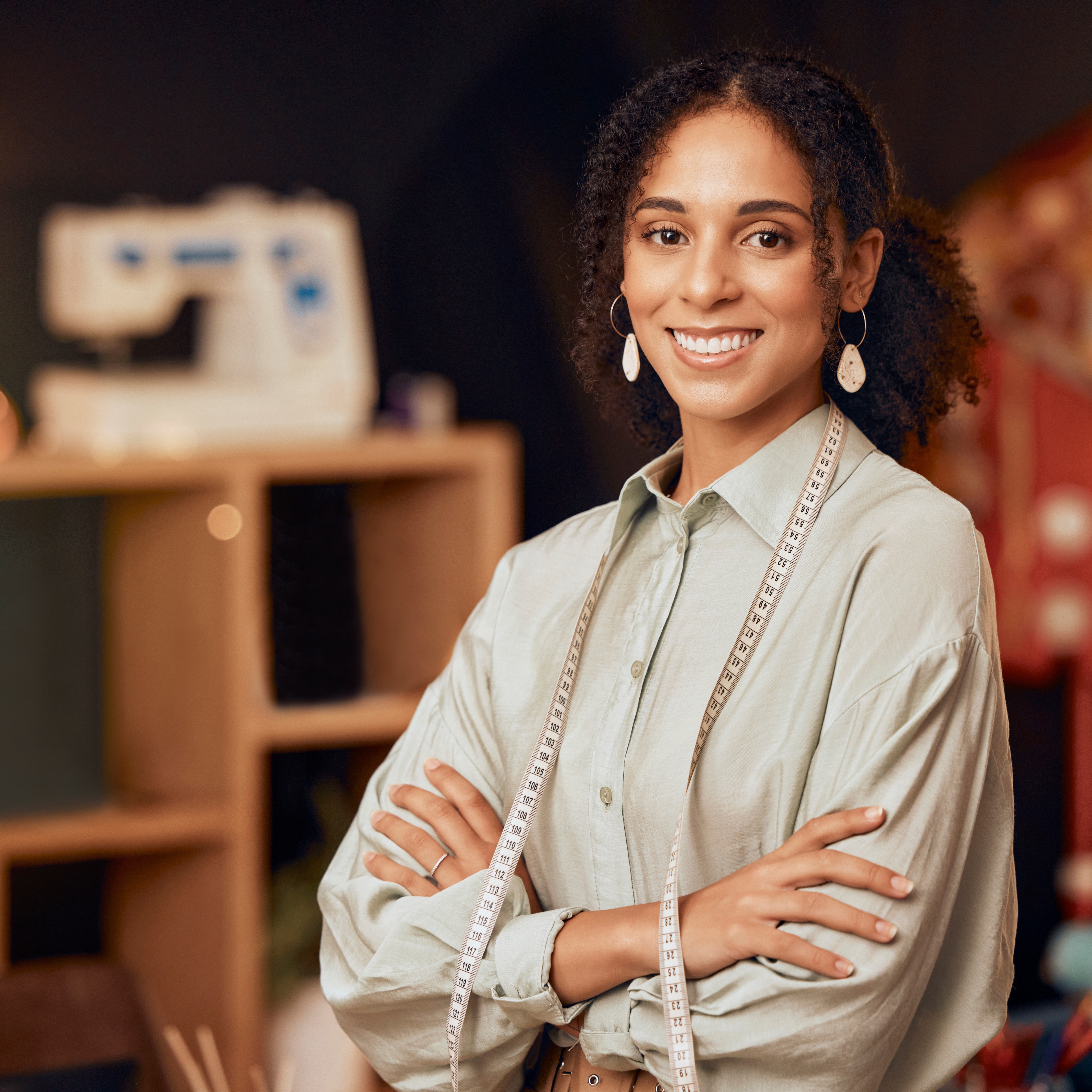 Modern web design workspace with computer showing website designs